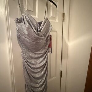 Emerald Sundae Glittering small strap dress 
Beautiful for New Years Eve ! 🥂